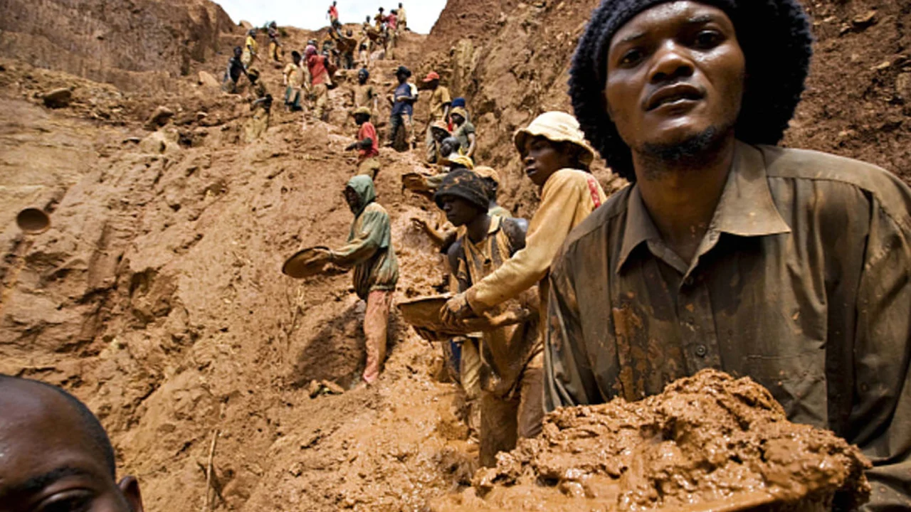 Miners on a hill.